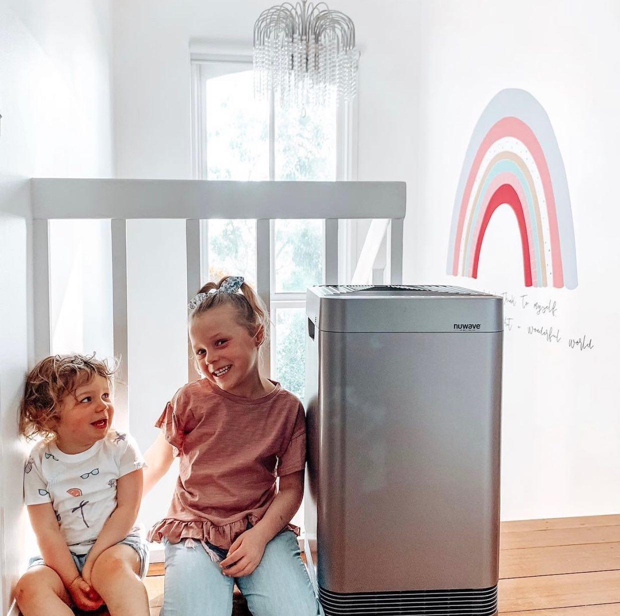 Joyful Children Benefiting from NuWave OxyPure Air Purifier for a Healthy Environment