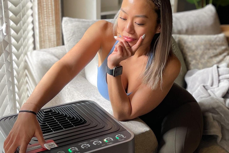 Fit and Healthy Lady Using NuWave OxyPure Air Purifier at Home