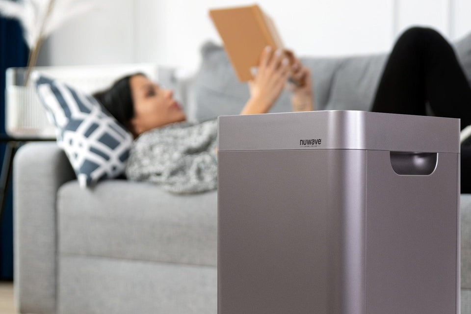 Woman Reading While NuWave OxyPure Air Purifier Cleans the Air
