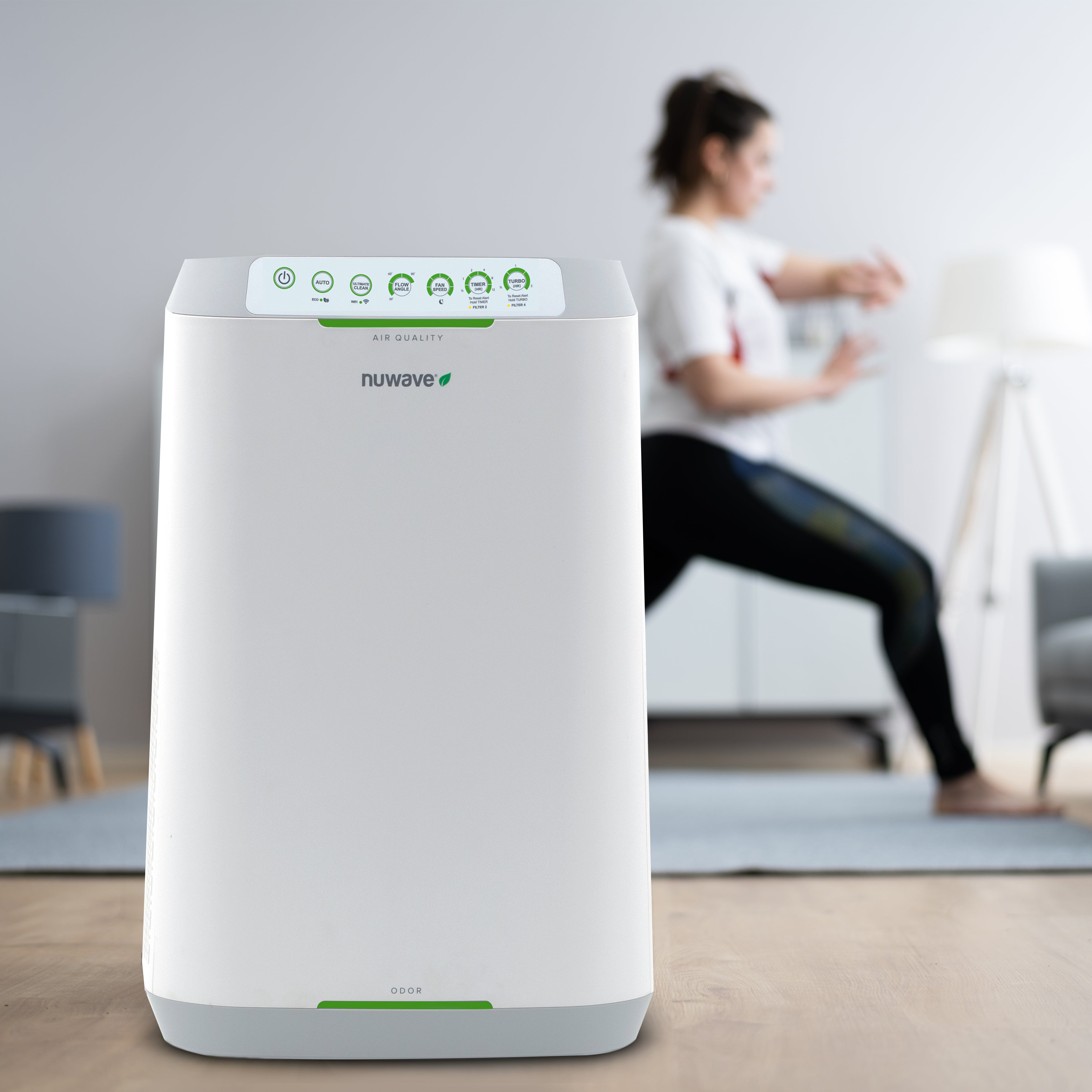Woman Enjoying Clean Indoor Breathing with OxyPure Smart Air Purifier